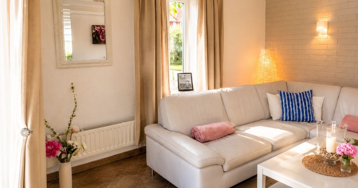 Sitzbereich mit Sofa im Haus Kastanie